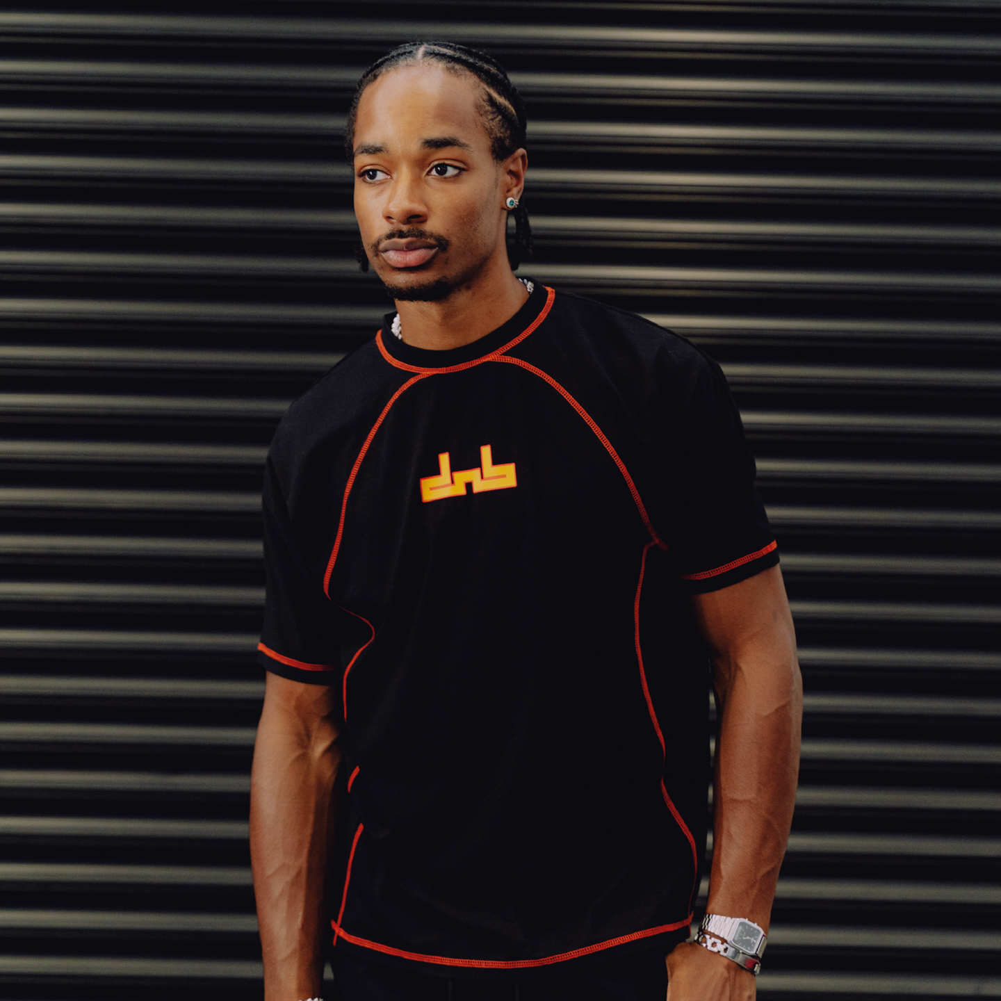 DNBA Flatlock Tee - Black/Orange